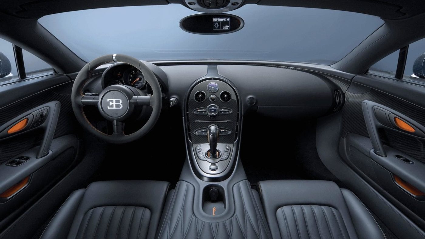 Bugatti Veyron Specs include a seven-speed transmission between the seats