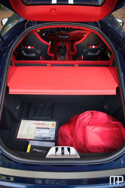 Behind the seats, the Ferrari F12tdf has plenty of cargo room